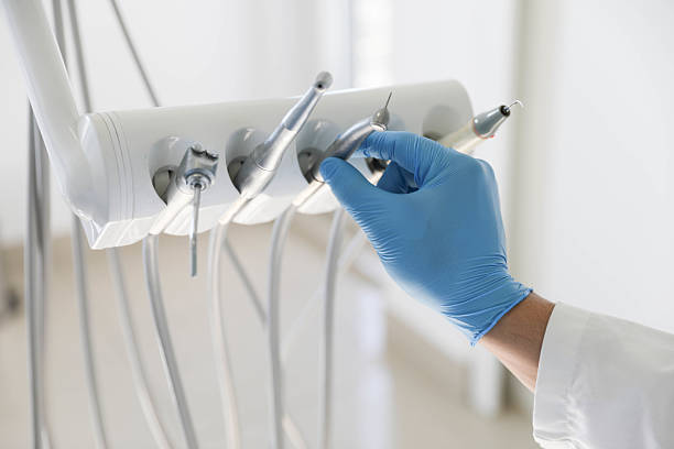Professional Tooth Extraction technician working in Trafalgar, IN